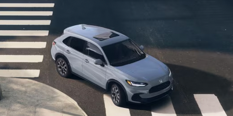2026 Grey CR‑V crossing streets in its stunning looks